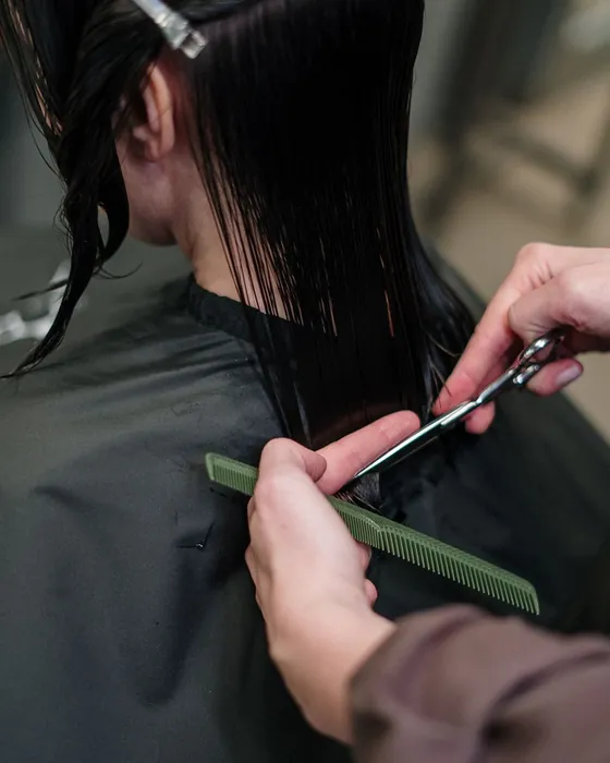 Scissors trimming wet hair
